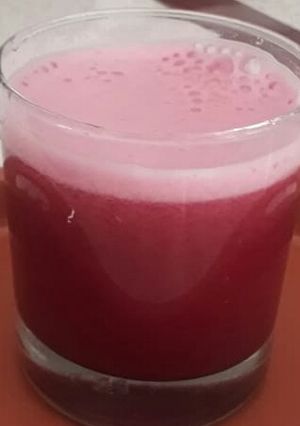 A picture of Orange, Carrot and Pomegranate juice.