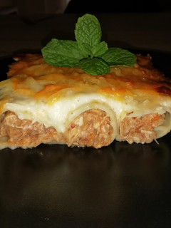 Una foto de Canelones de cocido
