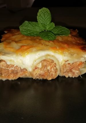 Una foto de Canelones de cocido