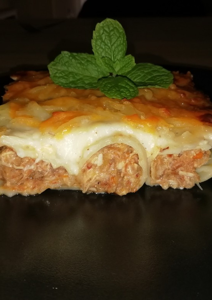 Una foto de Canelones de cocido