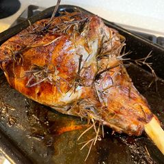 A picture of Roast Lamb Leg With Rosemary & Garlic.