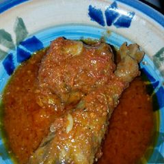 A picture of Tomato Chicken stew.