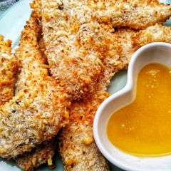Coconut Chicken Tenders With A Honey & Mustard Dip A picture of Coconut Chicken Tenders With A Honey & Mustard Dip.