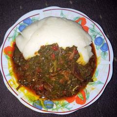 A picture of Poundo with waterleaf soup.