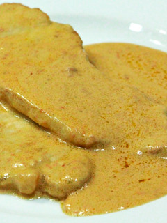 Una foto de Lomo ibérico con paté de pato