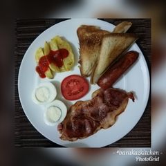 A picture of Bacon, bread and eggs breakfast.