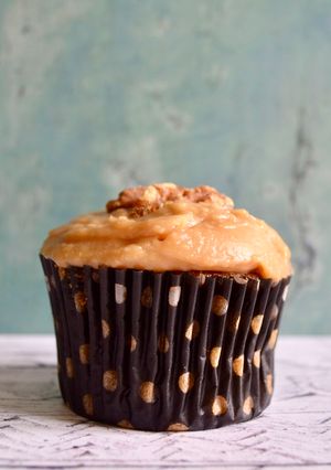 A picture of Coffee & Walnut Cupcakes with Caramel Icing.