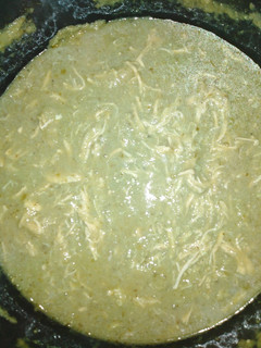 Una foto de Pollo desmenuzado en Mole verde