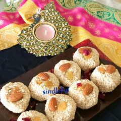 A picture of Borindas Til Ke Ladoos in Honey..Sindhi Special.