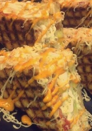 A picture of Schezwan grilled cheese sandwich.