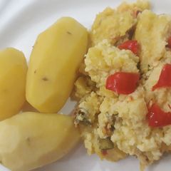 A picture of Boiled irish potatoes with scrambled egg.