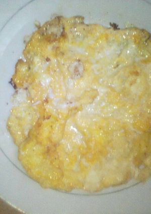 A picture of Flied egg with milk cream.