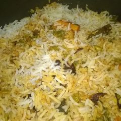 A picture of Vegetable Dum Pavbajji Biryani.