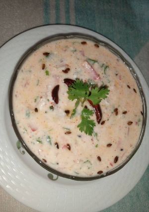 A picture of Onion Tomato Tadka Raita.
