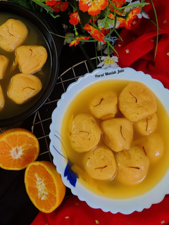 ऑरेंज फ्लेवर रसगुल्ले (orange flavour rasgulle recipe in Hindi) रेसिपी मुख्य फोटो