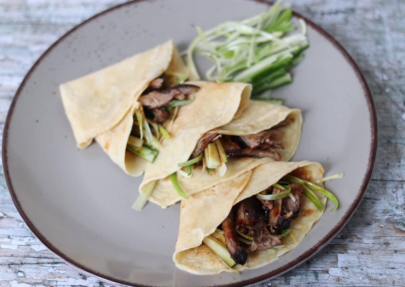 Grilled duck with homemade pancakes