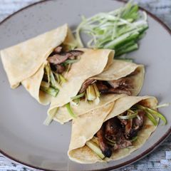 A picture of Crispy duck with homemade pancake.