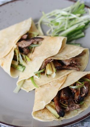 A picture of Crispy duck with homemade pancake.