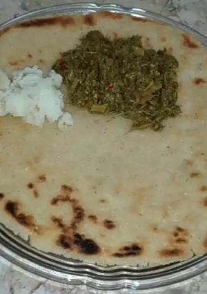 A picture of Sarsoun Ka Saag Maaki Ki Roti Or Makhan.
