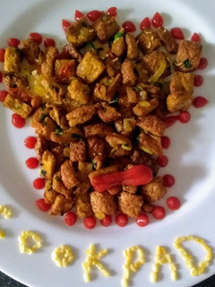 A picture of Spicy Bread poha.