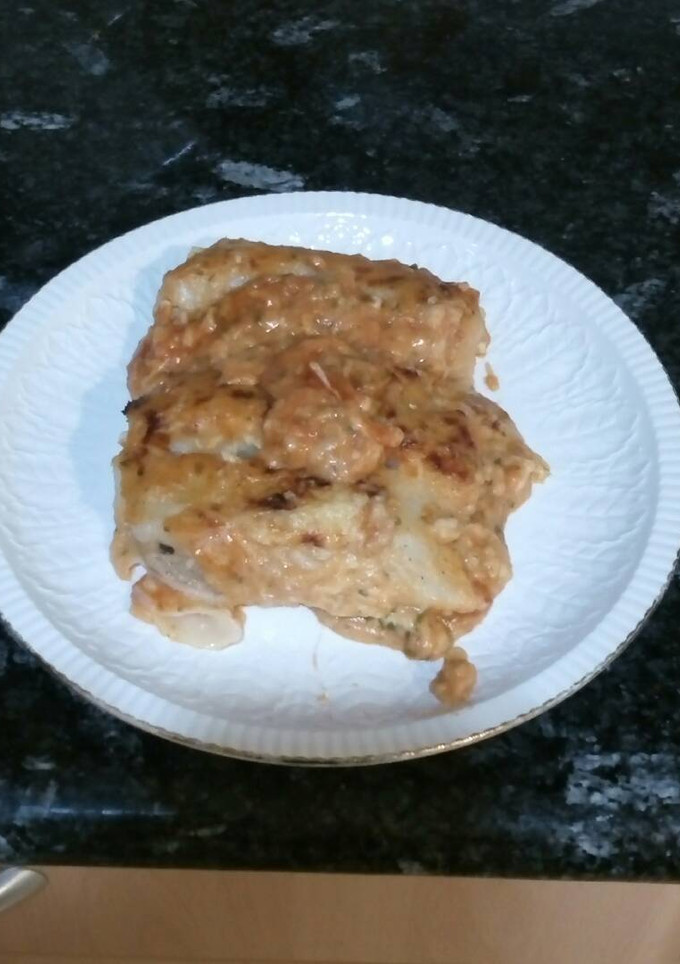 Una foto de Canelones con bechamel de tomate