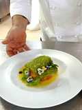 Filetto di Lampuga in crosta di pane alle erbe, su tortino di patate, tartufo, zucca e la sua acqua
