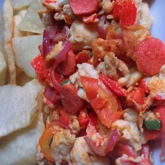 A picture of Fried yam and Egg sauce for a breakfast.