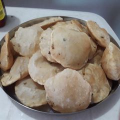 A picture of Luchi is the bengali cusin.