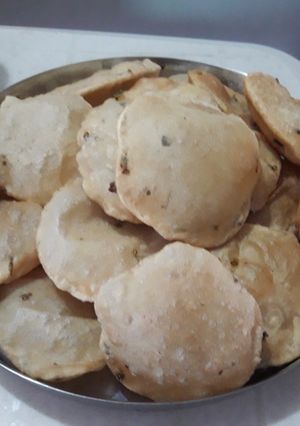 A picture of Luchi is the bengali cusin.