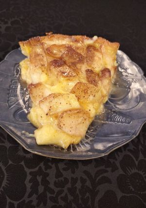 Una foto de Tarta tibia de manzanas y crema