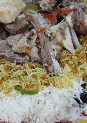 صورة لوصفة كبسة لحم حاشي مع الحمسه