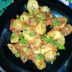 A picture of Spicy tamater fry alu.