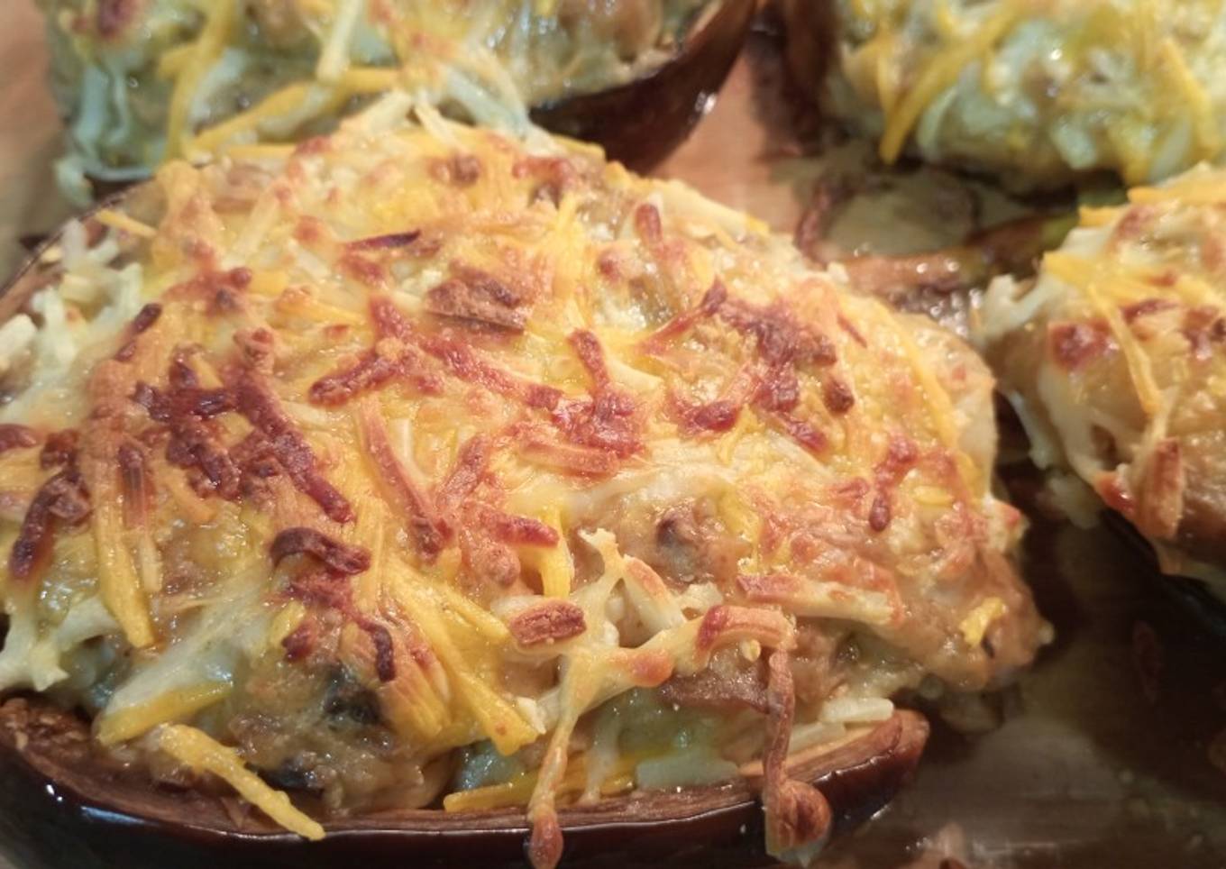 Berenjenas rellenas de champiñones y langostinos