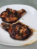 Marinated Pork Chops with Chutney and Grilled Parsley on the Plancha