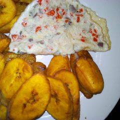 A picture of Plantain with fried egg.
