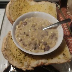 A picture of Mushroom and onion cheese steak pasta.