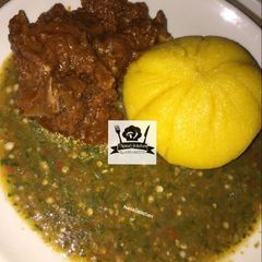A picture of Yellow Eba & Okra soup.