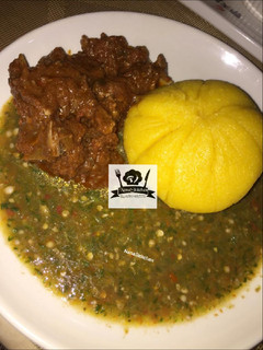 A picture of Yellow Eba & Okra soup.