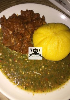 A picture of Yellow Eba & Okra soup.