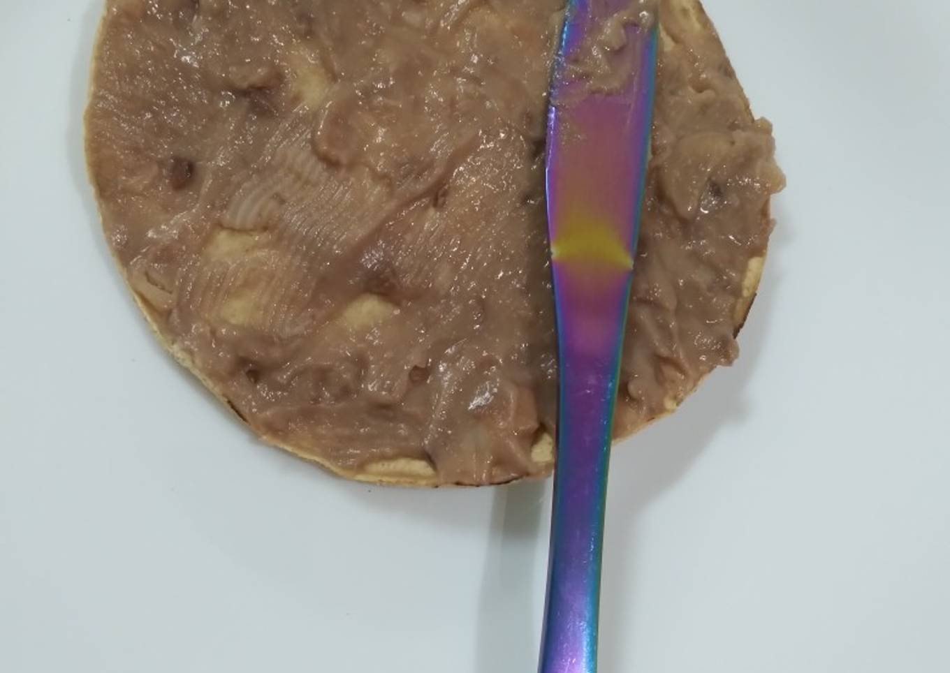 Frijoles refritos con cebolla