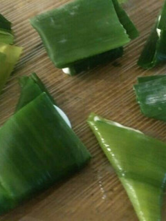 Una foto de Triángulos de hojas de puerro con queso crema