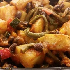 A picture of Papas con Nopalitos .