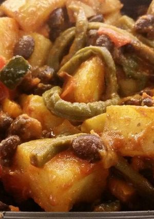 A picture of Papas con Nopalitos .