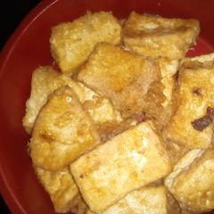 A picture of Fried tofu with eggs.
