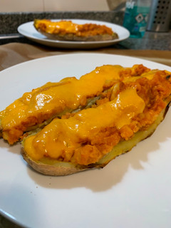 Una foto de Boniatos rellenos de boloñesa de Soja y cheddar