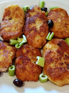 Una foto de Tortitas de patata rellenas