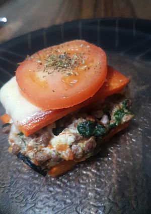 Una foto de Cuadraditos de calabaza y carne a la napolitana