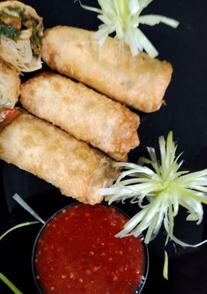 A picture of Chicken cheese spring roll.