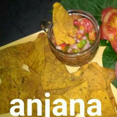 A picture of Tangy salsa with multigrain aachari nachos...