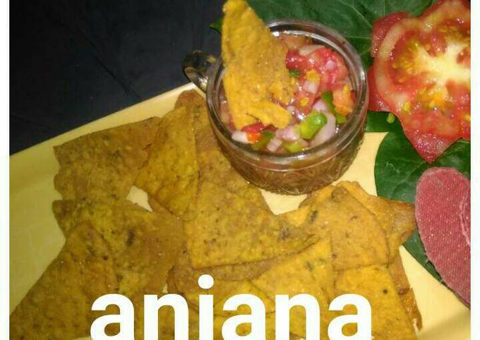Tangy salsa with multigrain aachari nachos..